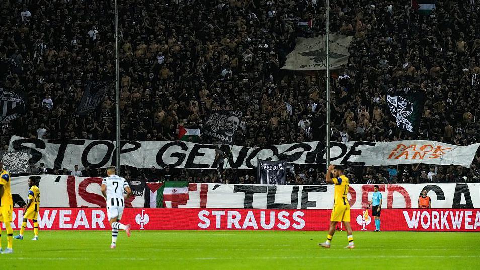 PAOK fans display banner with 'Stop genocide' message in match against Maccabi Tel Aviv