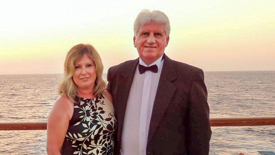 Susan and Gary Baird pictured on a the deck of a boat