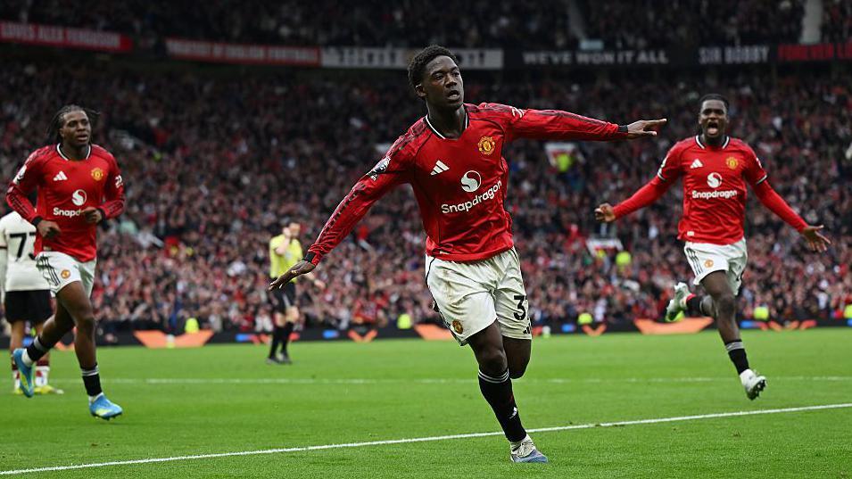 Kobbie Mainoo celebrates scoring the winner for Manchester United against Liverpool at Old Trafford