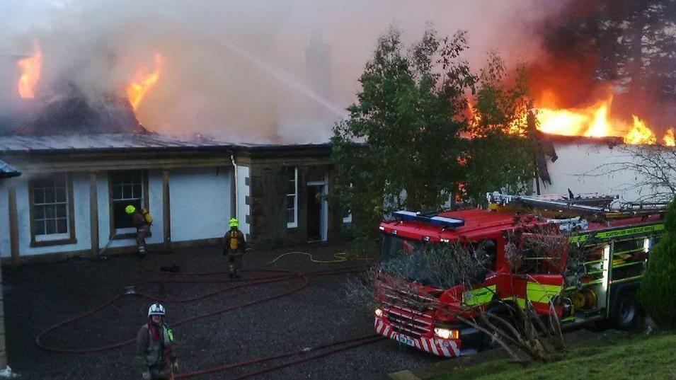 Boleskine House on fire with engines attending