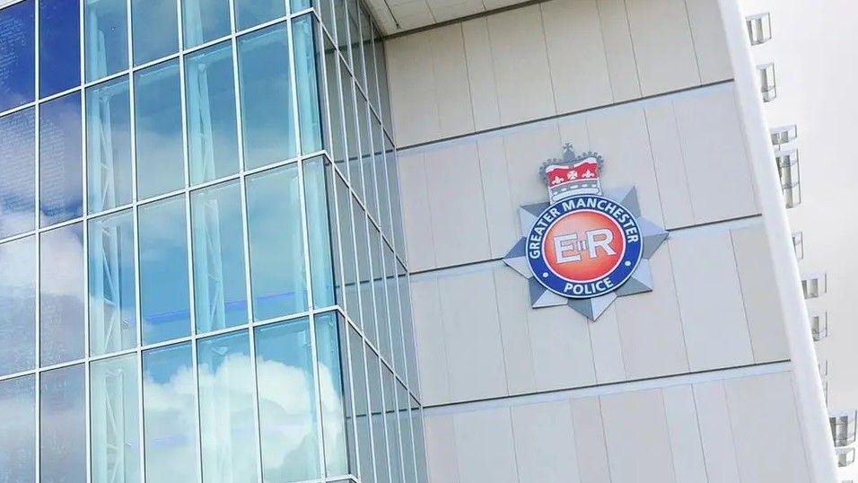 The front of GMP HQ which is partly all glass with white panels which have the force logo on them.