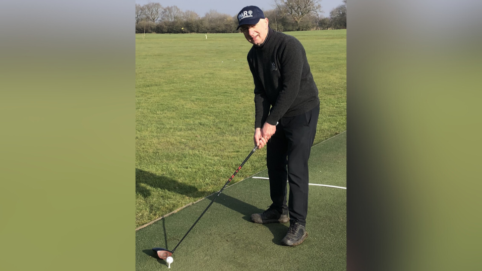 Tony Bruce playing golf