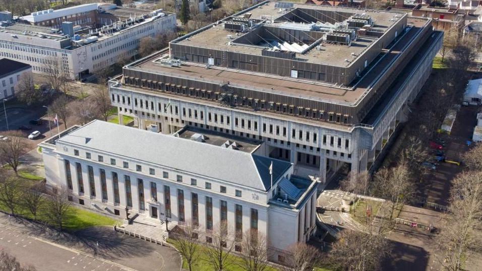 An aerial view of the Welsh government building in Cathays Park, Cardiff. It is made up of two buildings, with the one in the front appearing to be a quarter of the size of the one behind it.