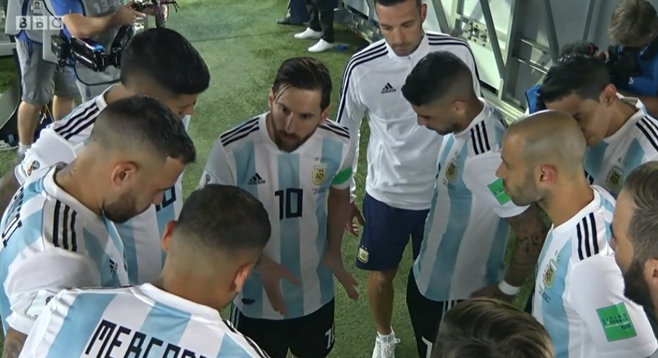 Lionel Messi gives a half-time team talk