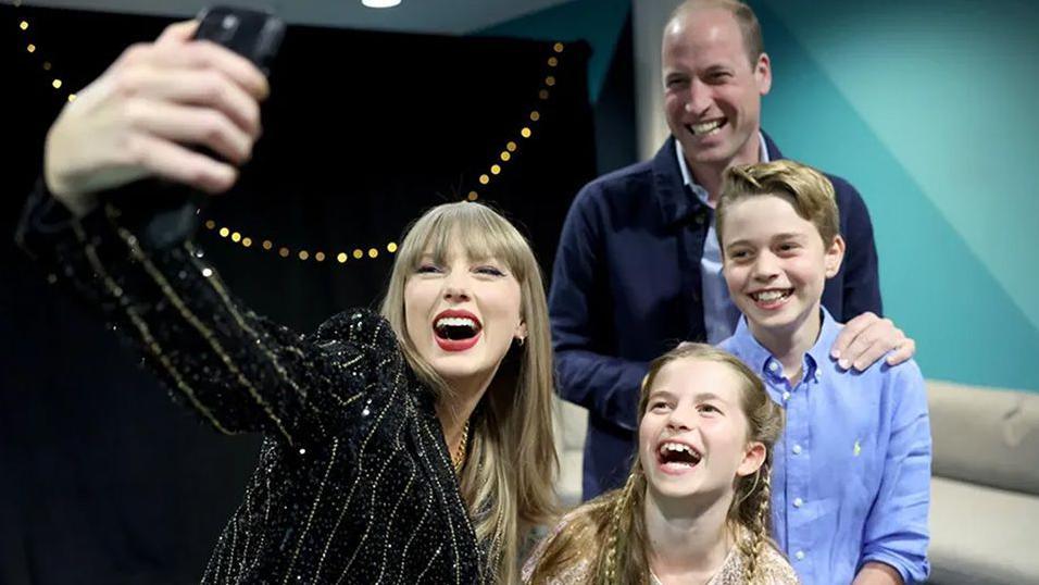 taylor swift taking selfie with princess charlotte and princes george and william