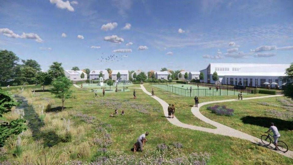 An artistic interpretation of the finished site. There are people walking a cycling through a park-like area with white houses and a community building in the background.