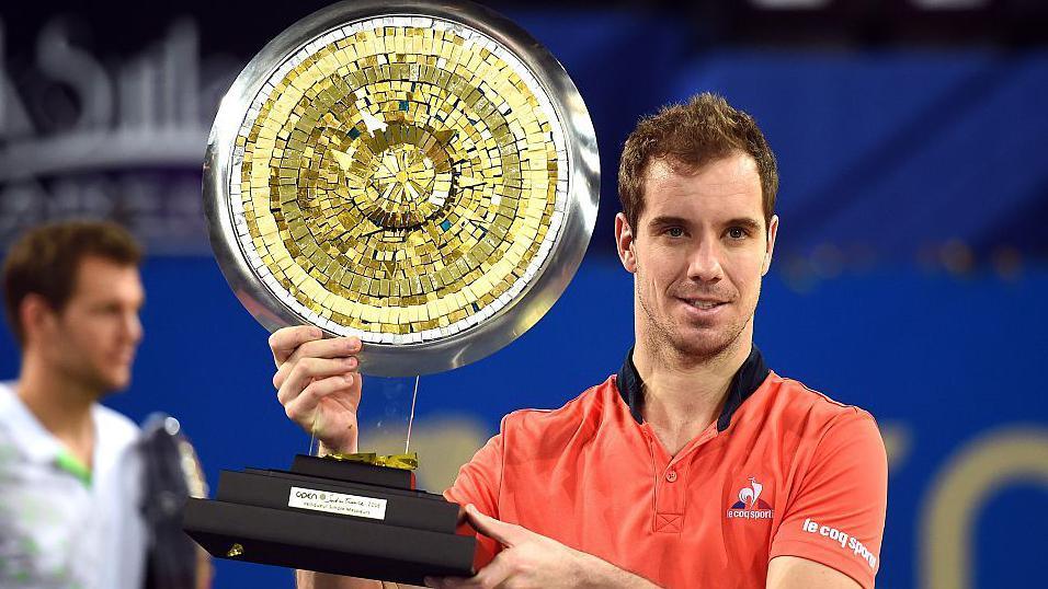 Richard Gasquet holds the ATP Montpellier trophy