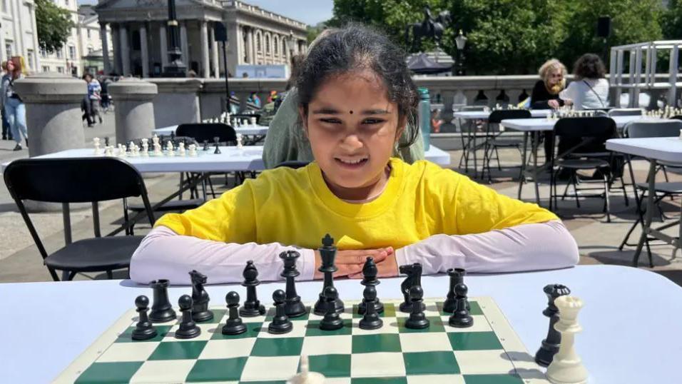 Bodhana playing chess.