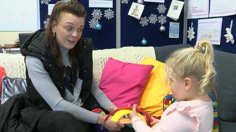 Tiphanie Lowe playing with her four-year-old daughter