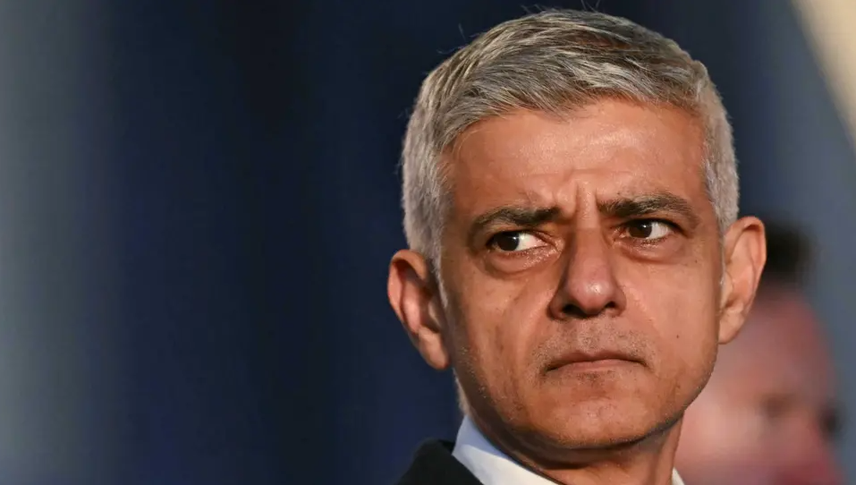 London Mayor Sadiq Khan close up - looking behind and to the left