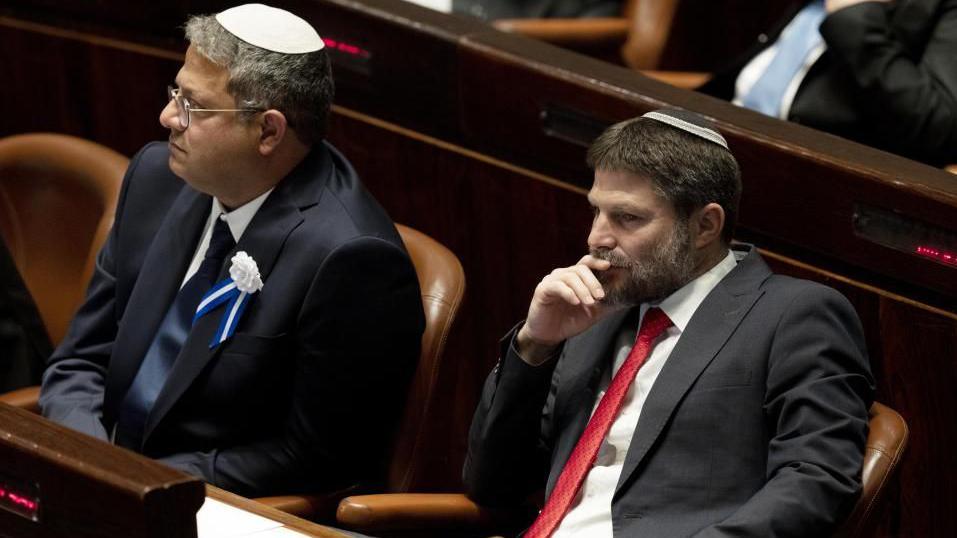 Israeli lawmakers Itamar Ben Gvir and Bezalel Smotrich sitting in the Knesset during a parliamentary hearing