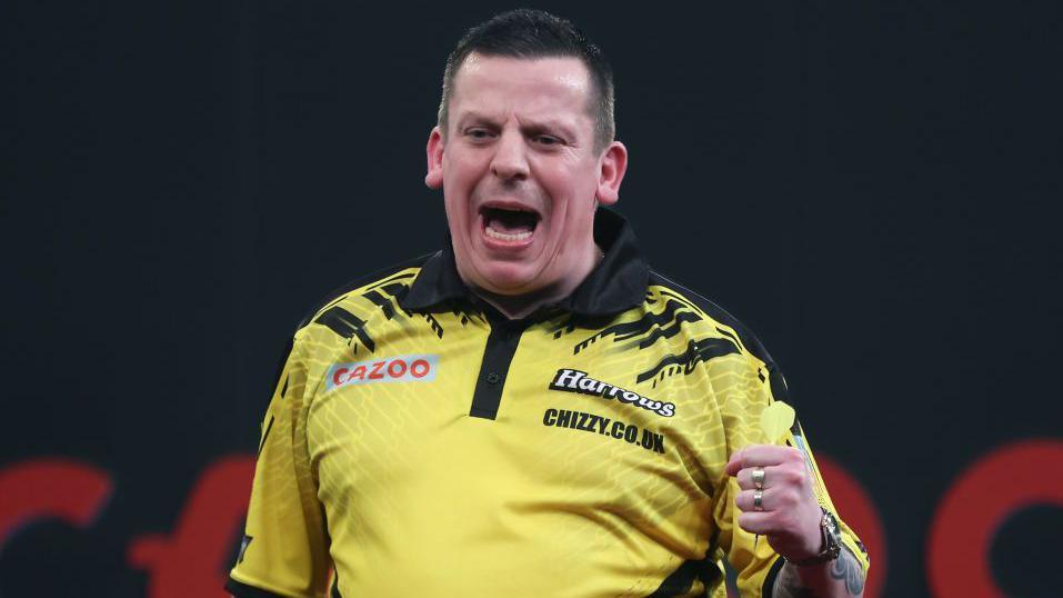 Dave Chisnall celebrates