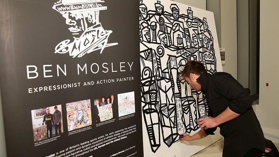 Ben Mosley at the 2014 Fifa World Cup McDonald's launch party in New York City creating a painting.