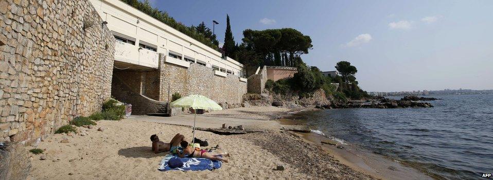 General view of the public beach called "La Mirandole", located below a villa owned by the Saudi King, on 20 July, 2015