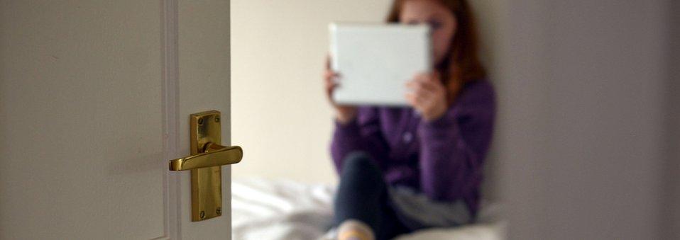 Child looking at a tablet computer