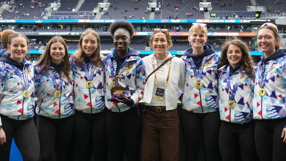 Great Britain women's flag football team with England footballer Lucy Bronze at an NFL game at Tottenham on 5 October 2025