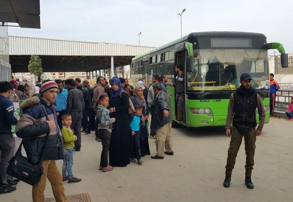 Civilians and fighters await evacuation in Al-Waer, Homs