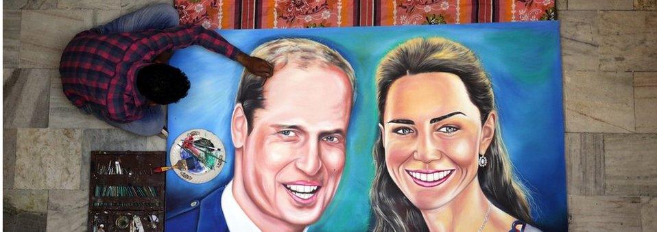 Artist Jagjot Singh Rubal puts the finishing touches to a painting of the Duke and Duchess of Cambridge at his studio in Amritsar