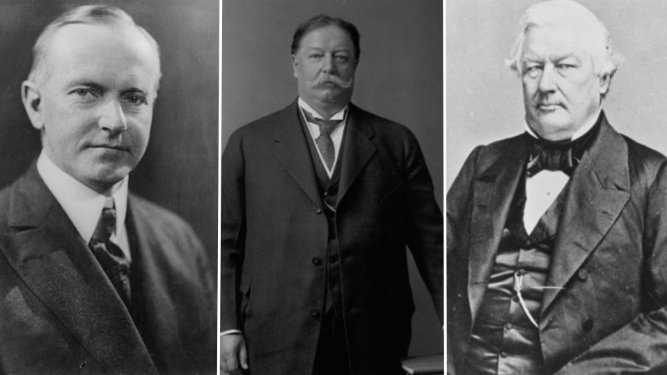 Three portraits of the men side by side. On the left is Calvin Coolidge. He's wearing a neutral expression on his face, wearing a suit, shirt and tie, looking at the camera but facing to the right. In the middle is William Howard Taft - a large man stood wearing a black suit and waistcoat, with short hair and handlebar moustache. On the right is Millard Filmore. He's wearing a dinner suit and bow tie, with what you might say is a grumpy expression on his face, looking at the camera but facing towards the left. 