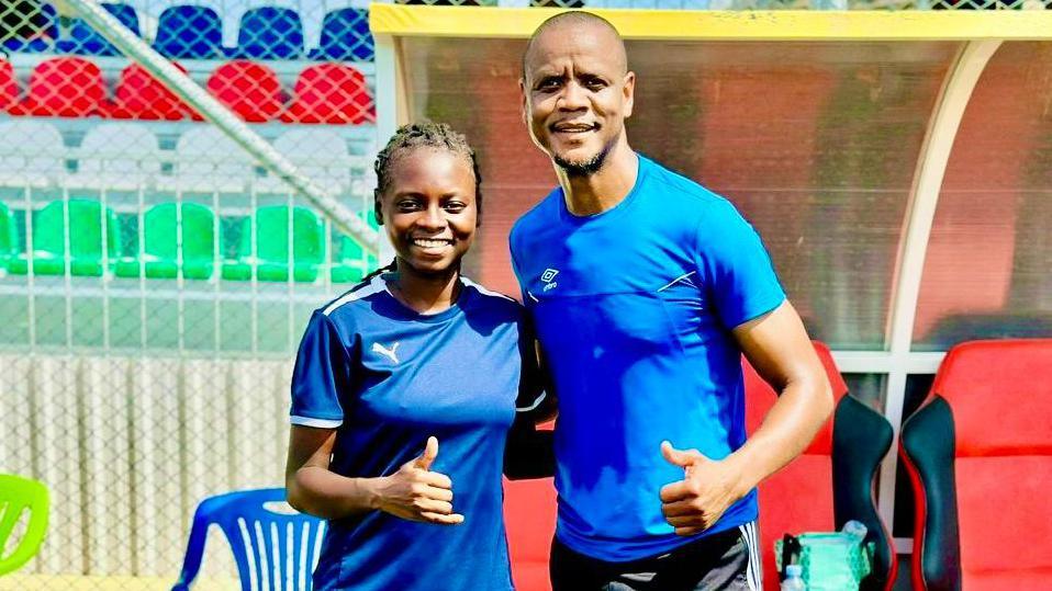 Gbemisola Yusuf with Zambian referee instructor Janny Sikazwe at the finals of the Caf African School Football Championship in Tanzania