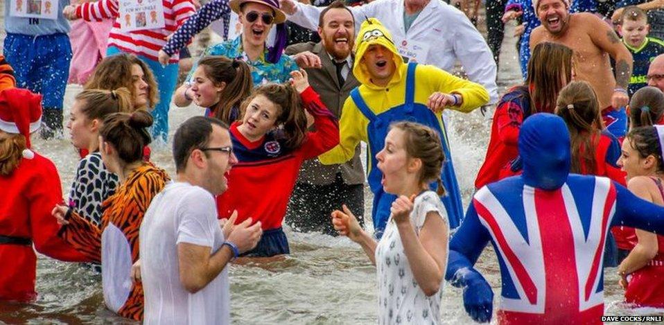 A group of swimmers feel the cold