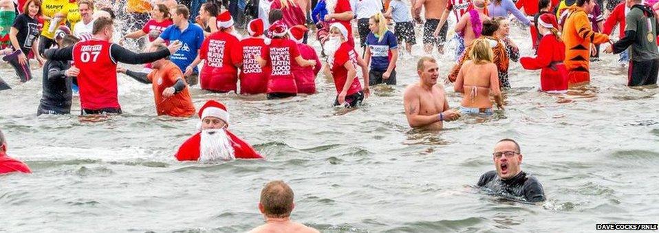 Father Christmas takes a dip