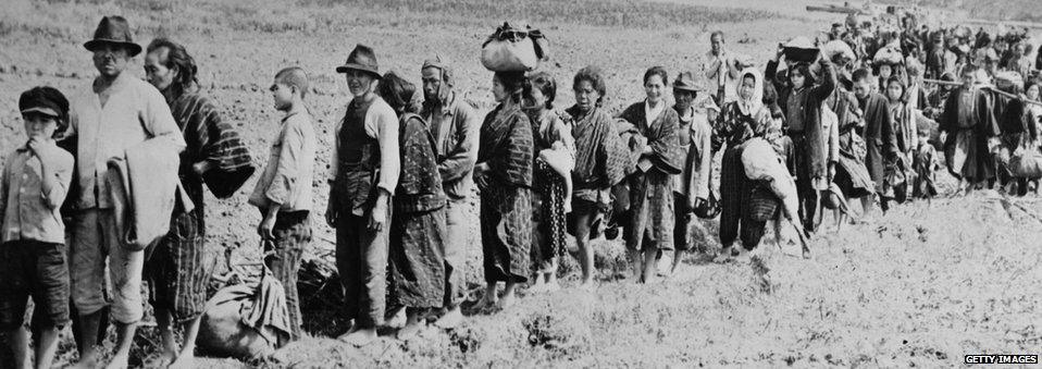 17th April 1945: Okinawa civilians returning from hiding places in the hills following the invasion of the island by American soldiers