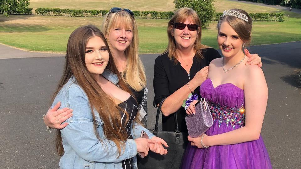 Evie with her mum and two sisters