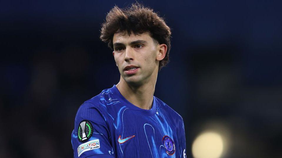 Joao Felix wearing a bluish Chelsea shirt