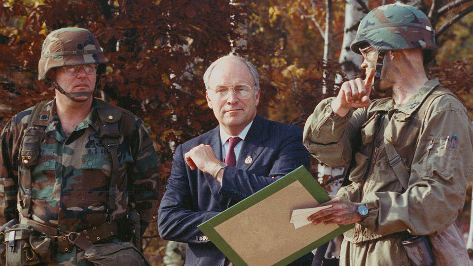 Soldiers briefing Dick Cheney in 1989