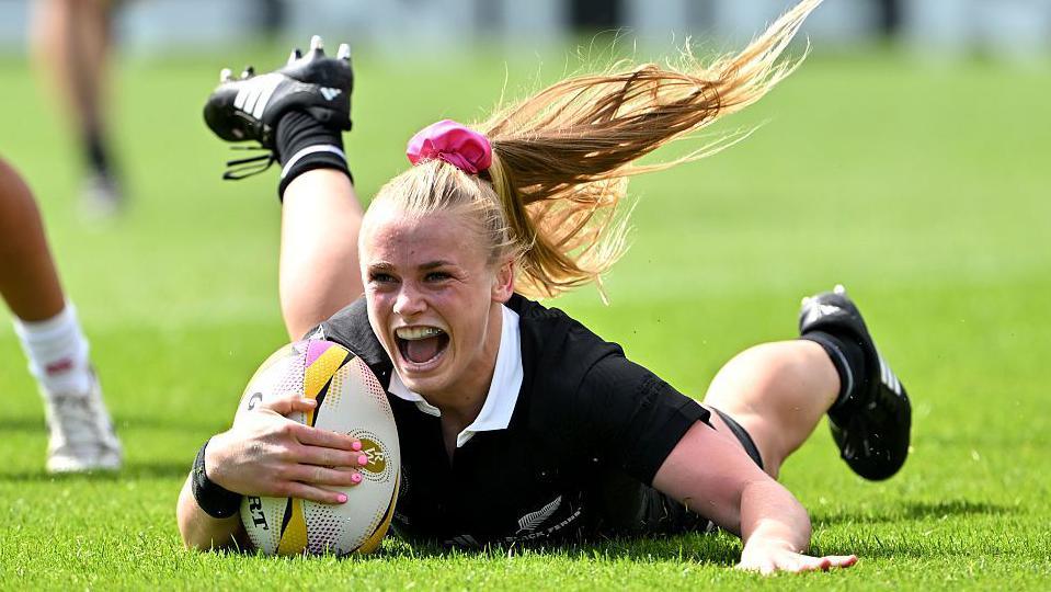 Jorja Miller celebrates scoring against Japan