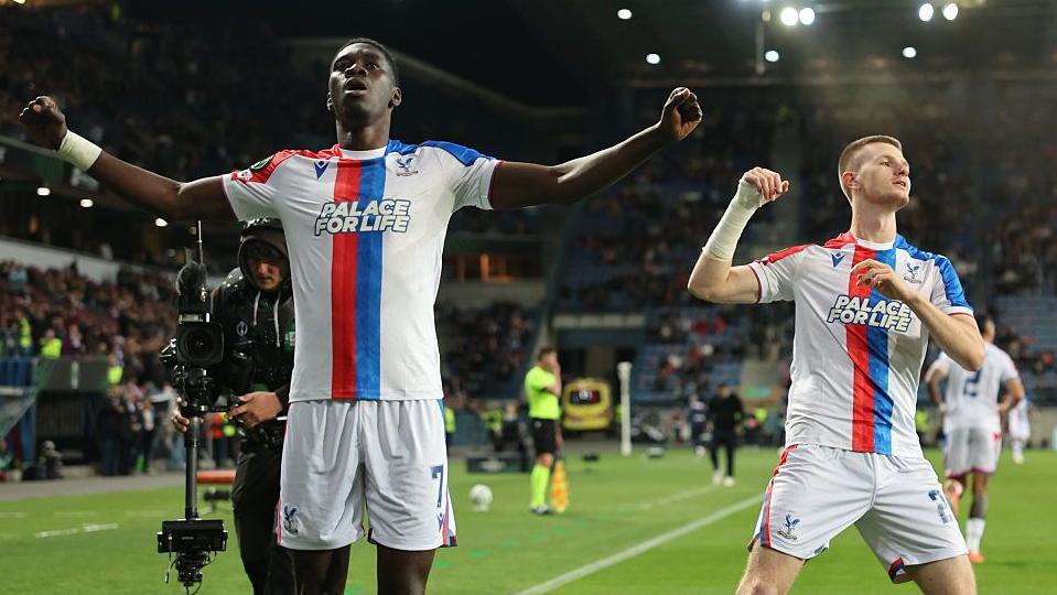 Crystal Palace players celebrate Ismaila Sarr's opening goal