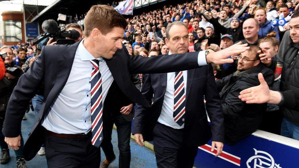 Rangers fans celebrate with Steven Gerrard 