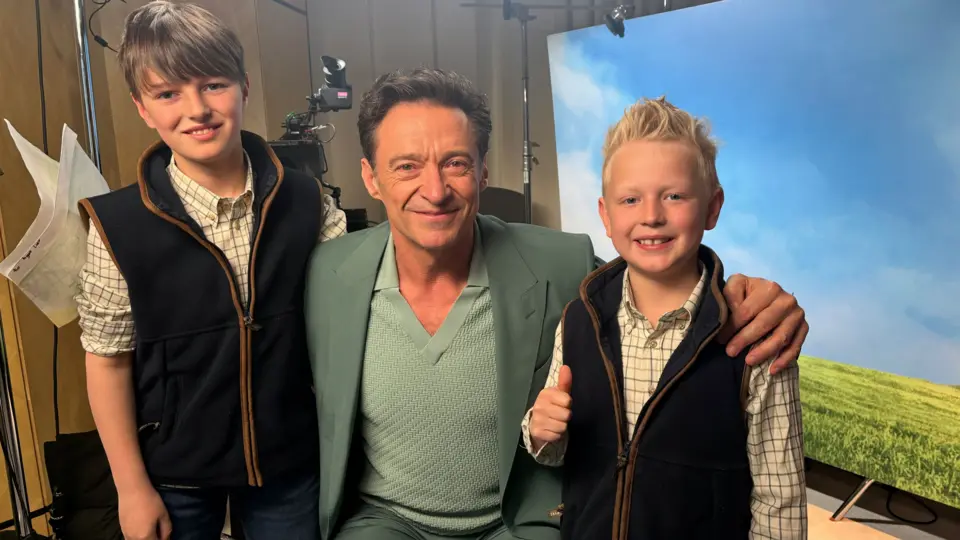 Hugh Jackman with brothers William and Jack.