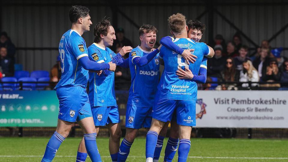 Haverfordwest County players celebrate Williams Hughes' goal