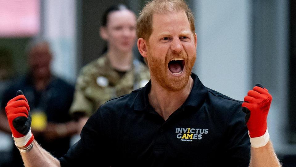 Prince Harry wearing gloves as as he played wheelchair rugby at an event in Birmingham for the Invictus Games