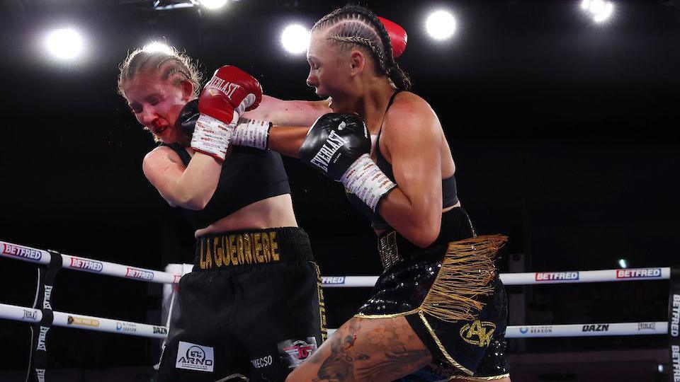 A bloodied Lydie Bialic is punched by Tiah-Mai Ayton