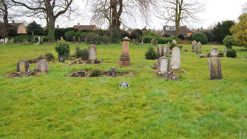 An image of Jimmy Logan's unmarked grave in Loughborough Cemetery