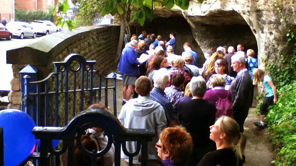 Queue of people waiting to view the caves