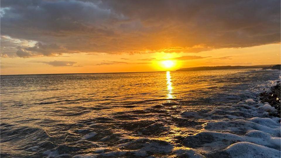 Sunset over the sea in Seaford