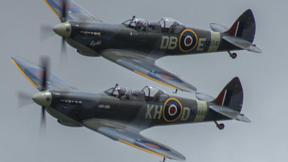 Two RAF planes flying next to each other