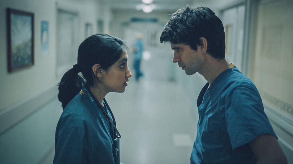 Two doctors looking at each other