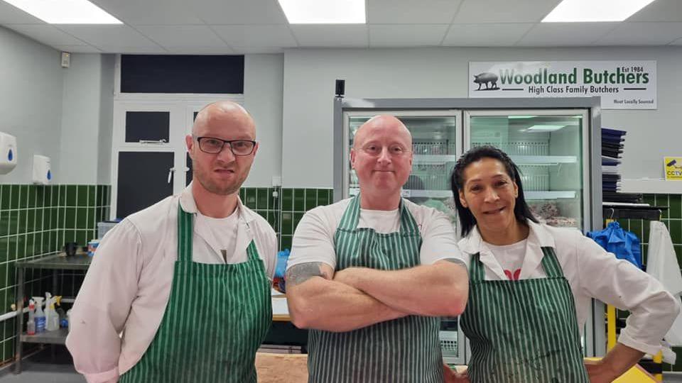 Phil Woodland, centre, with members of his staff 