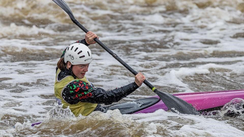 Ruth Bramley negotiating choppy water in her canoe.  