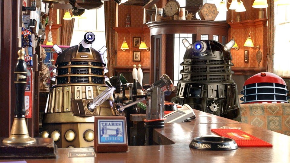 Two Daleks inside the Queen Vic pub.