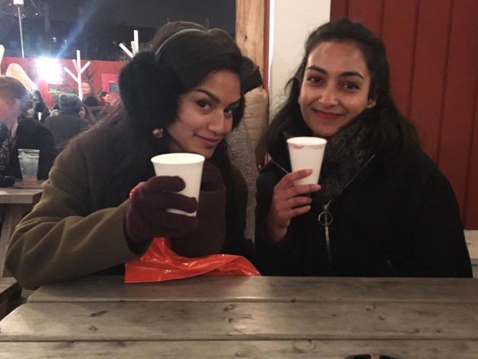 Ruchira Sharma (right) with a friend at a Christmas market