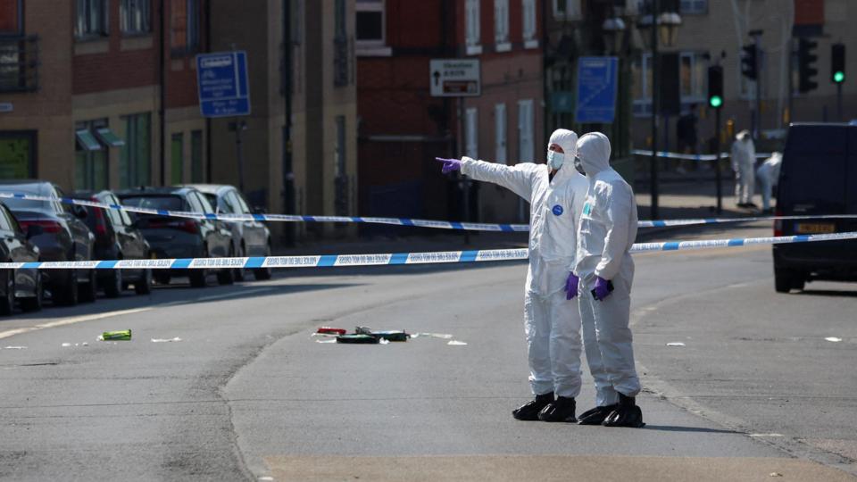 Forensic officers inside a police cordon in Nottingham on the day of the attacks in June 2023.