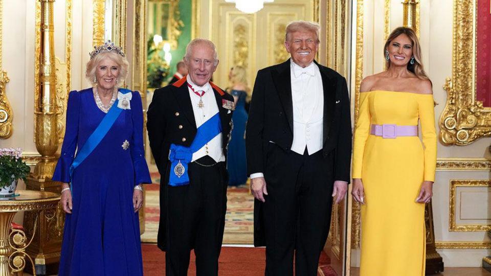 Queen Camilla, King Charles, President and First lady pose.
