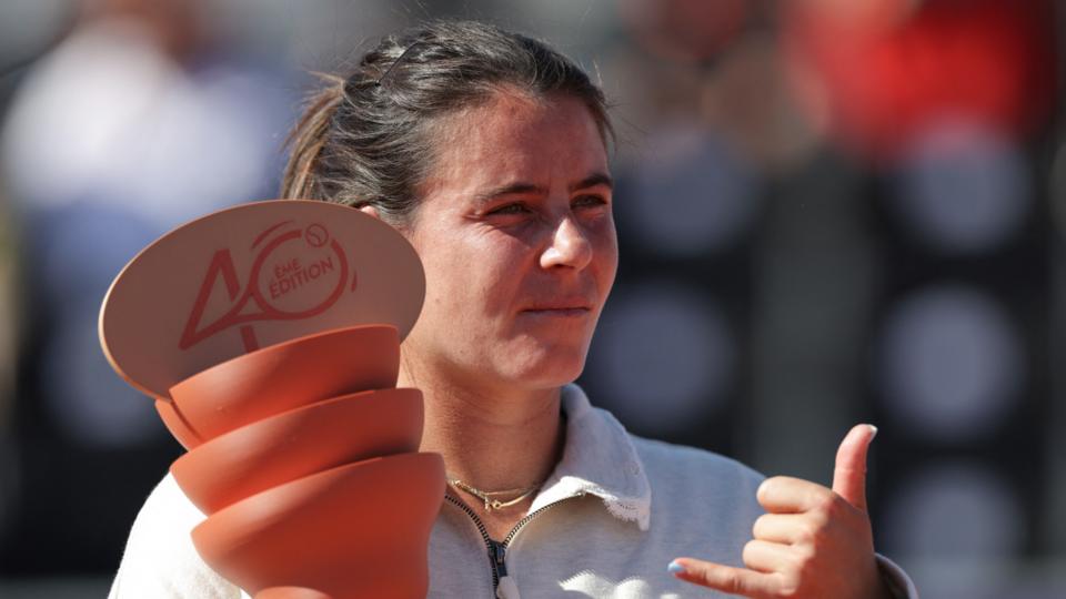 Emma Navarro celebrates winning Strasbourg Open as she holds the orange trophy