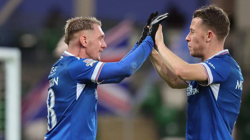 Calumn Morrison is congratulated by Kyle McClean